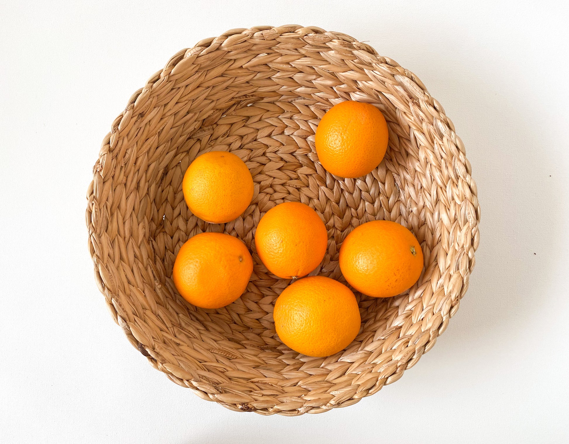 Evara’s artisanal storage basket handcrafted from 100% natural banana fiber, designed with a sturdy woven structure, minimalist aesthetic, and smooth natural finish. Ideal for organizing living spaces, storing linens, toys, or accessories. Lightweight yet durable, with reinforced edges and optional handles for easy mobility. A biodegradable, eco-friendly home décor piece that blends functionality with timeless elegance.