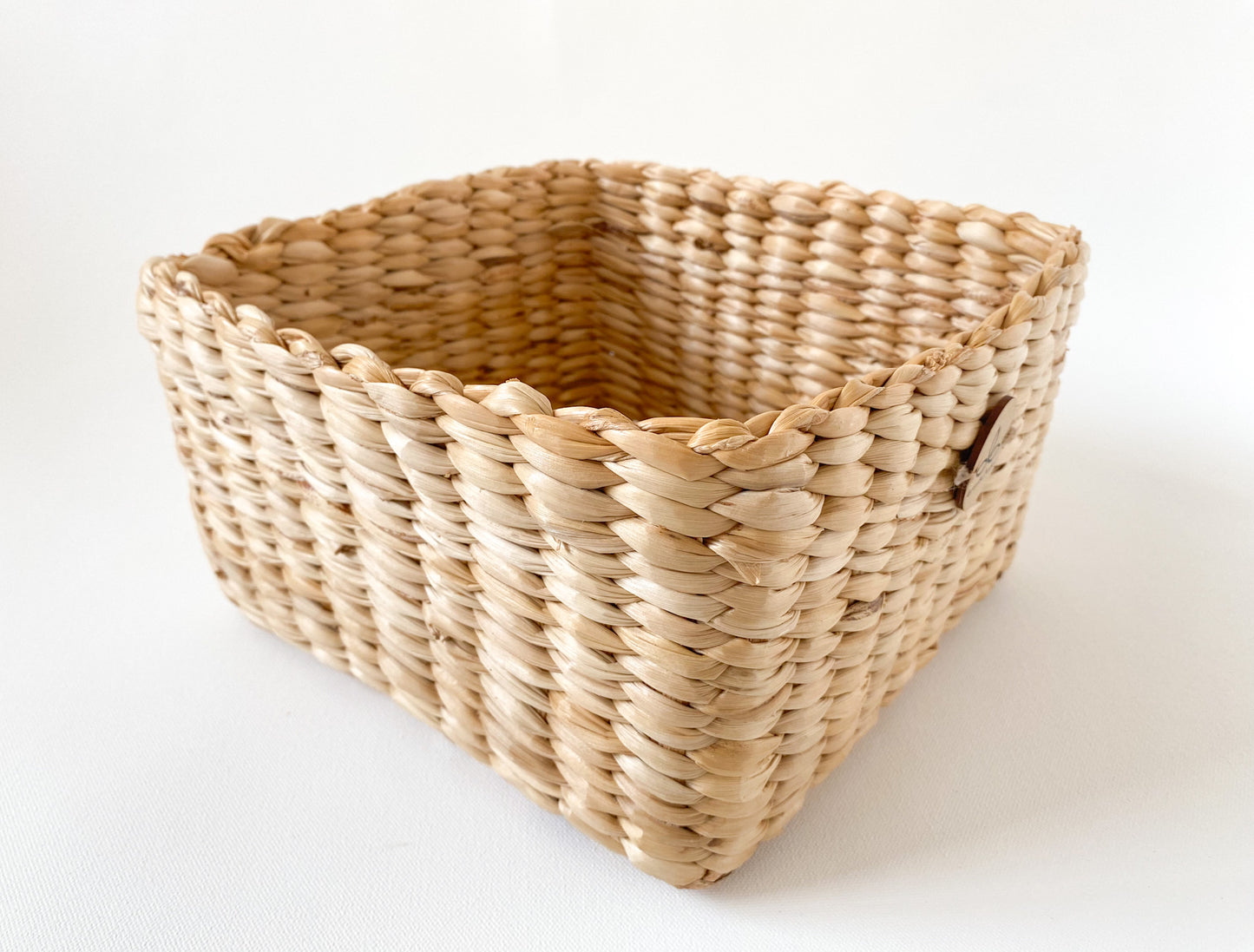 Evara’s artisanal storage basket handcrafted from 100% natural banana fiber, designed with a sturdy woven structure, minimalist aesthetic, and smooth natural finish. Ideal for organizing living spaces, storing linens, toys, or accessories. Lightweight yet durable, with reinforced edges and optional handles for easy mobility. A biodegradable, eco-friendly home décor piece that blends functionality with timeless elegance.