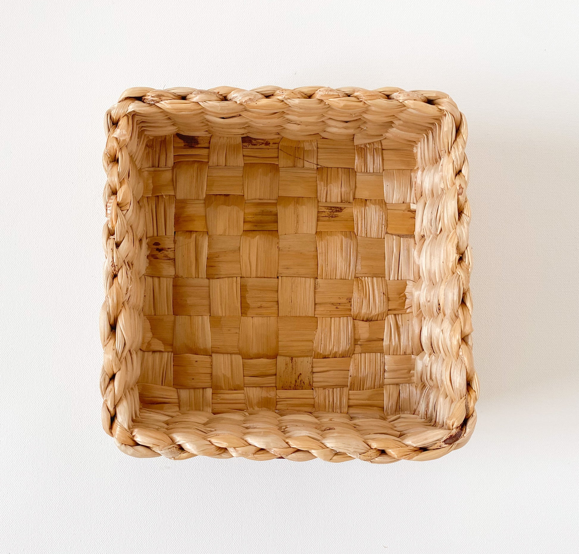 Evara’s artisanal storage basket handcrafted from 100% natural banana fiber, designed with a sturdy woven structure, minimalist aesthetic, and smooth natural finish. Ideal for organizing living spaces, storing linens, toys, or accessories. Lightweight yet durable, with reinforced edges and optional handles for easy mobility. A biodegradable, eco-friendly home décor piece that blends functionality with timeless elegance.