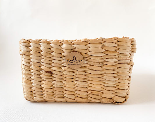 Evara’s artisanal storage basket handcrafted from 100% natural banana fiber, designed with a sturdy woven structure, minimalist aesthetic, and smooth natural finish. Ideal for organizing living spaces, storing linens, toys, or accessories. Lightweight yet durable, with reinforced edges and optional handles for easy mobility. A biodegradable, eco-friendly home décor piece that blends functionality with timeless elegance.