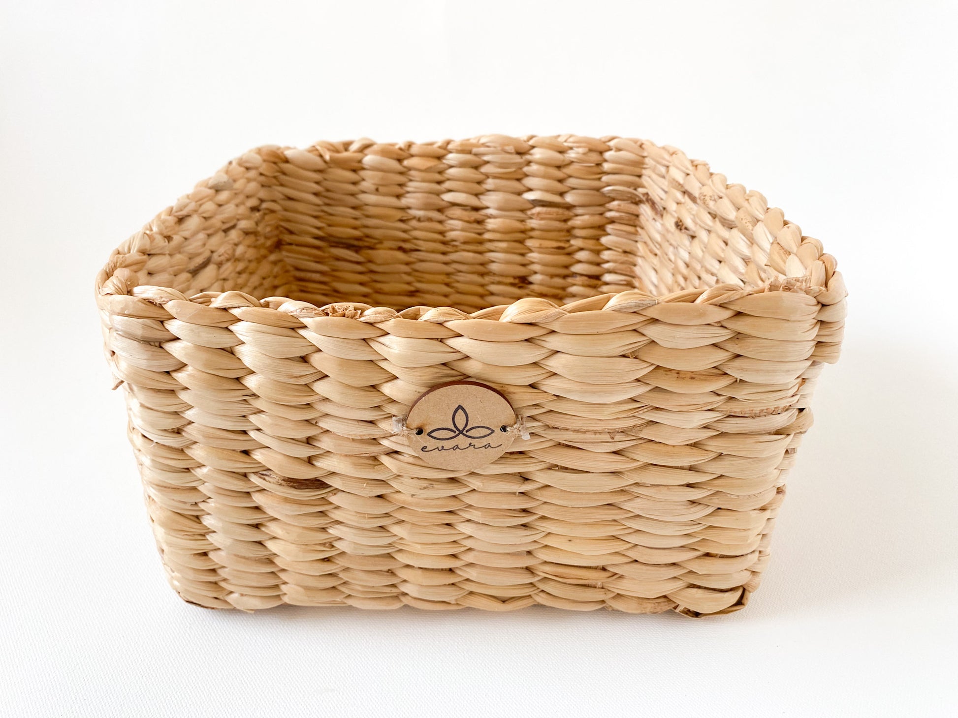 Evara’s artisanal storage basket handcrafted from 100% natural banana fiber, designed with a sturdy woven structure, minimalist aesthetic, and smooth natural finish. Ideal for organizing living spaces, storing linens, toys, or accessories. Lightweight yet durable, with reinforced edges and optional handles for easy mobility. A biodegradable, eco-friendly home décor piece that blends functionality with timeless elegance.