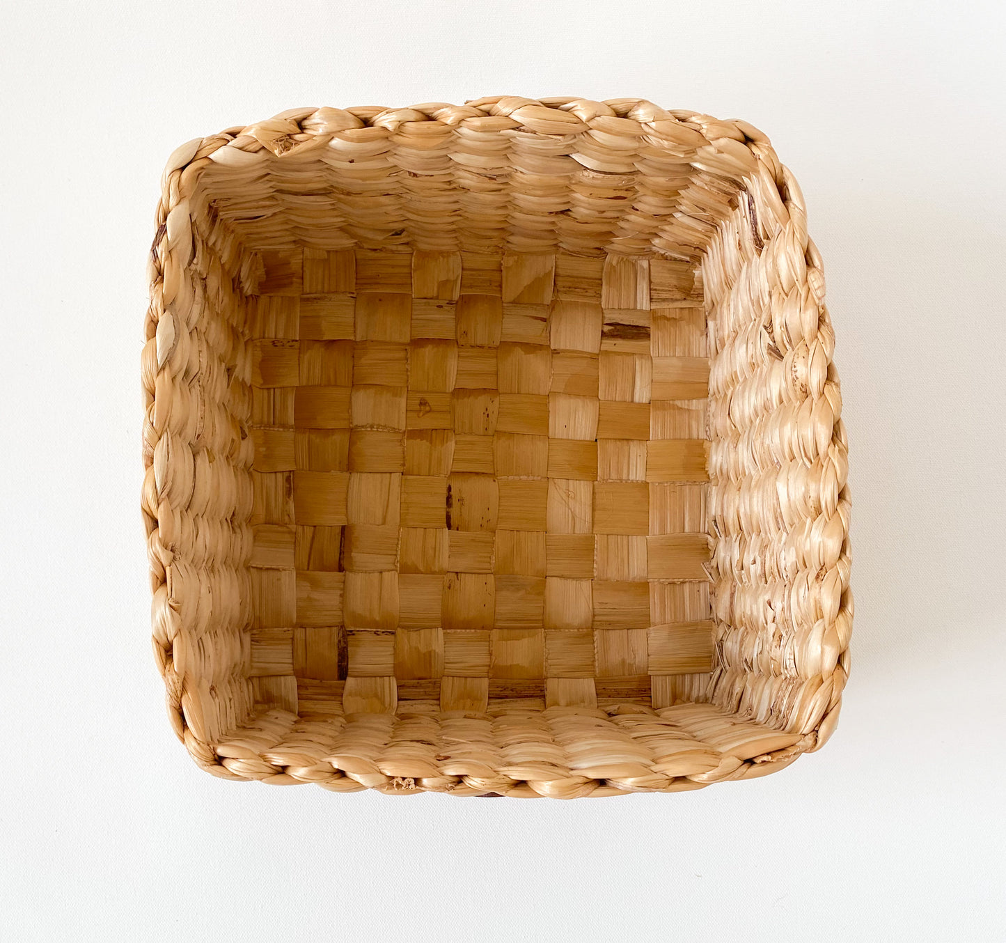Evara’s artisanal storage basket handcrafted from 100% natural banana fiber, designed with a sturdy woven structure, minimalist aesthetic, and smooth natural finish. Ideal for organizing living spaces, storing linens, toys, or accessories. Lightweight yet durable, with reinforced edges and optional handles for easy mobility. A biodegradable, eco-friendly home décor piece that blends functionality with timeless elegance.
