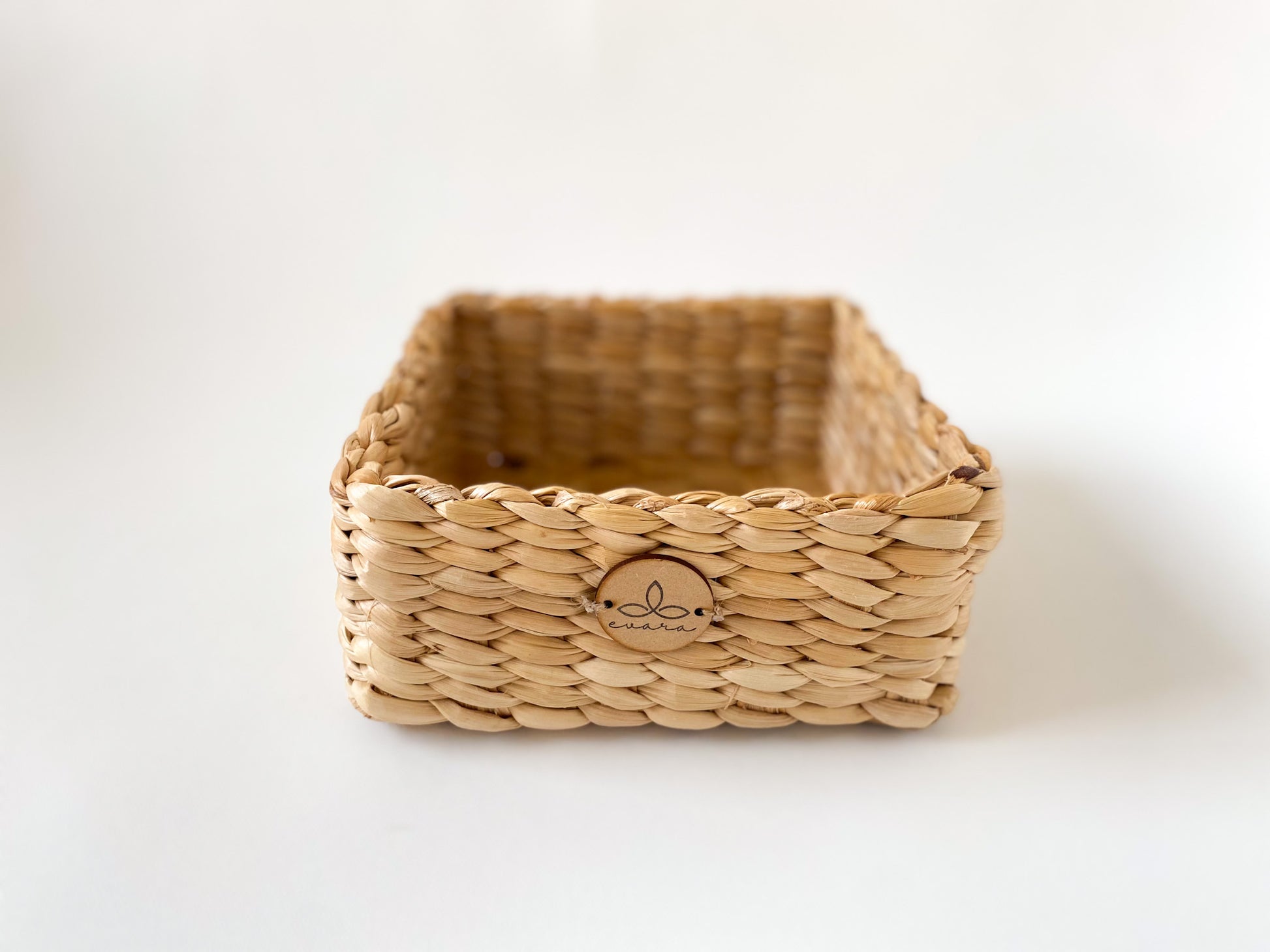 Evara’s artisanal storage basket handcrafted from 100% natural banana fiber, designed with a sturdy woven structure, minimalist aesthetic, and smooth natural finish. Ideal for organizing living spaces, storing linens, toys, or accessories. Lightweight yet durable, with reinforced edges and optional handles for easy mobility. A biodegradable, eco-friendly home décor piece that blends functionality with timeless elegance.