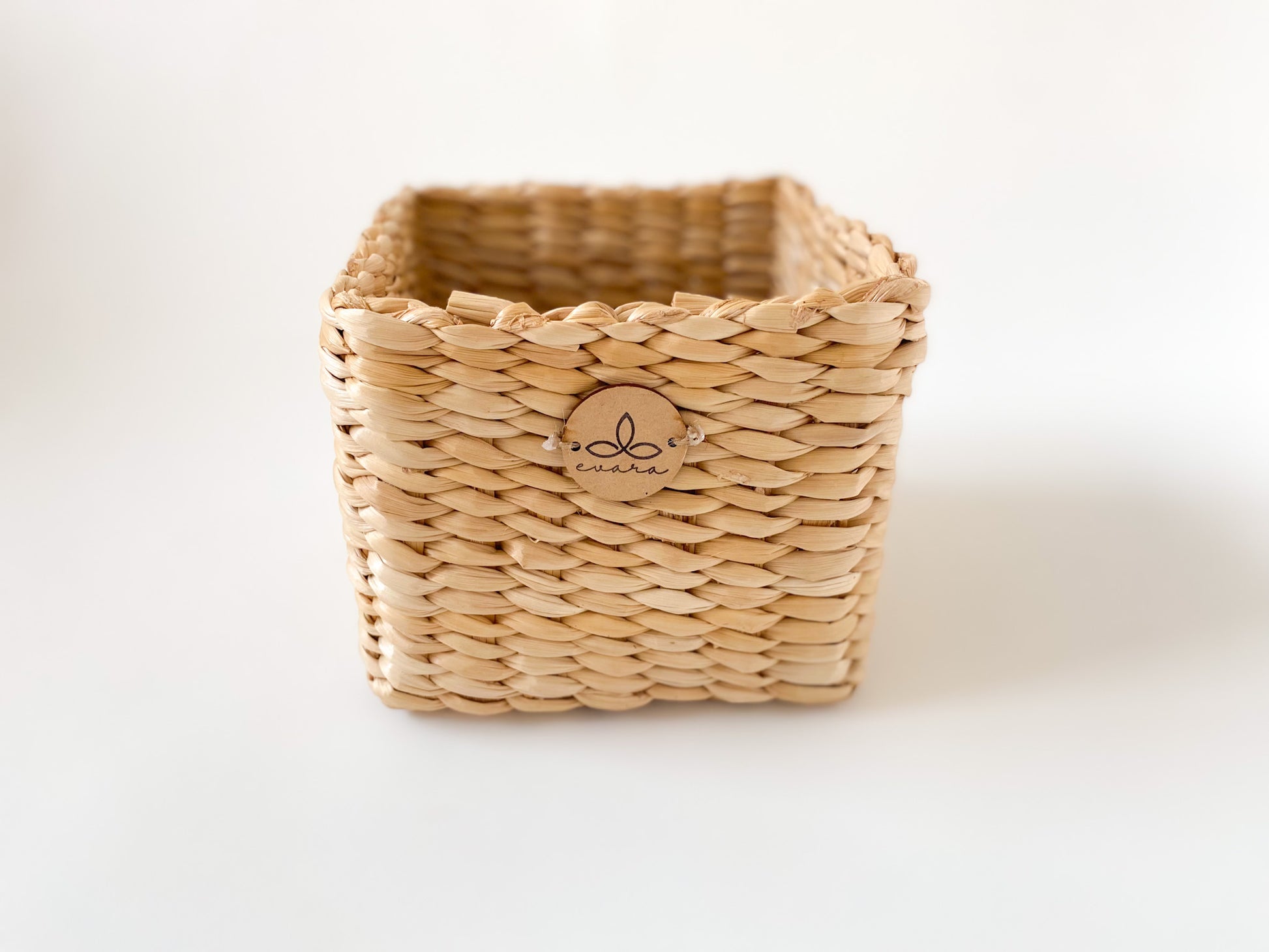 Evara’s artisanal storage basket handcrafted from 100% natural banana fiber, designed with a sturdy woven structure, minimalist aesthetic, and smooth natural finish. Ideal for organizing living spaces, storing linens, toys, or accessories. Lightweight yet durable, with reinforced edges and optional handles for easy mobility. A biodegradable, eco-friendly home décor piece that blends functionality with timeless elegance.