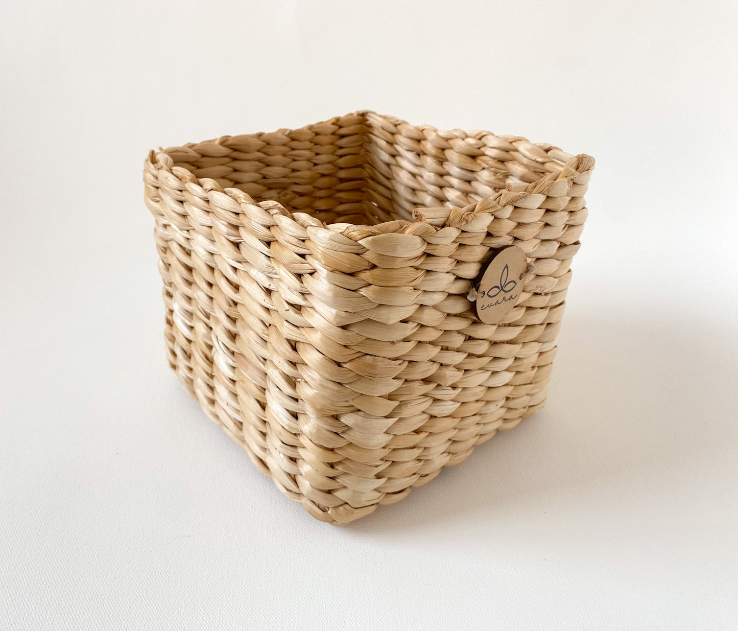 Evara’s artisanal storage basket handcrafted from 100% natural banana fiber, designed with a sturdy woven structure, minimalist aesthetic, and smooth natural finish. Ideal for organizing living spaces, storing linens, toys, or accessories. Lightweight yet durable, with reinforced edges and optional handles for easy mobility. A biodegradable, eco-friendly home décor piece that blends functionality with timeless elegance.