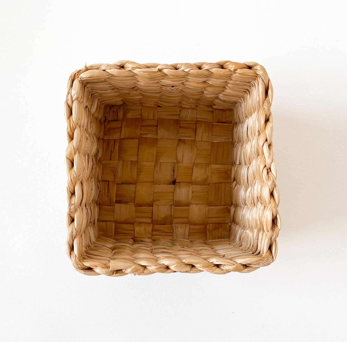 Evara’s artisanal storage basket handcrafted from 100% natural banana fiber, designed with a sturdy woven structure, minimalist aesthetic, and smooth natural finish. Ideal for organizing living spaces, storing linens, toys, or accessories. Lightweight yet durable, with reinforced edges and optional handles for easy mobility. A biodegradable, eco-friendly home décor piece that blends functionality with timeless elegance.