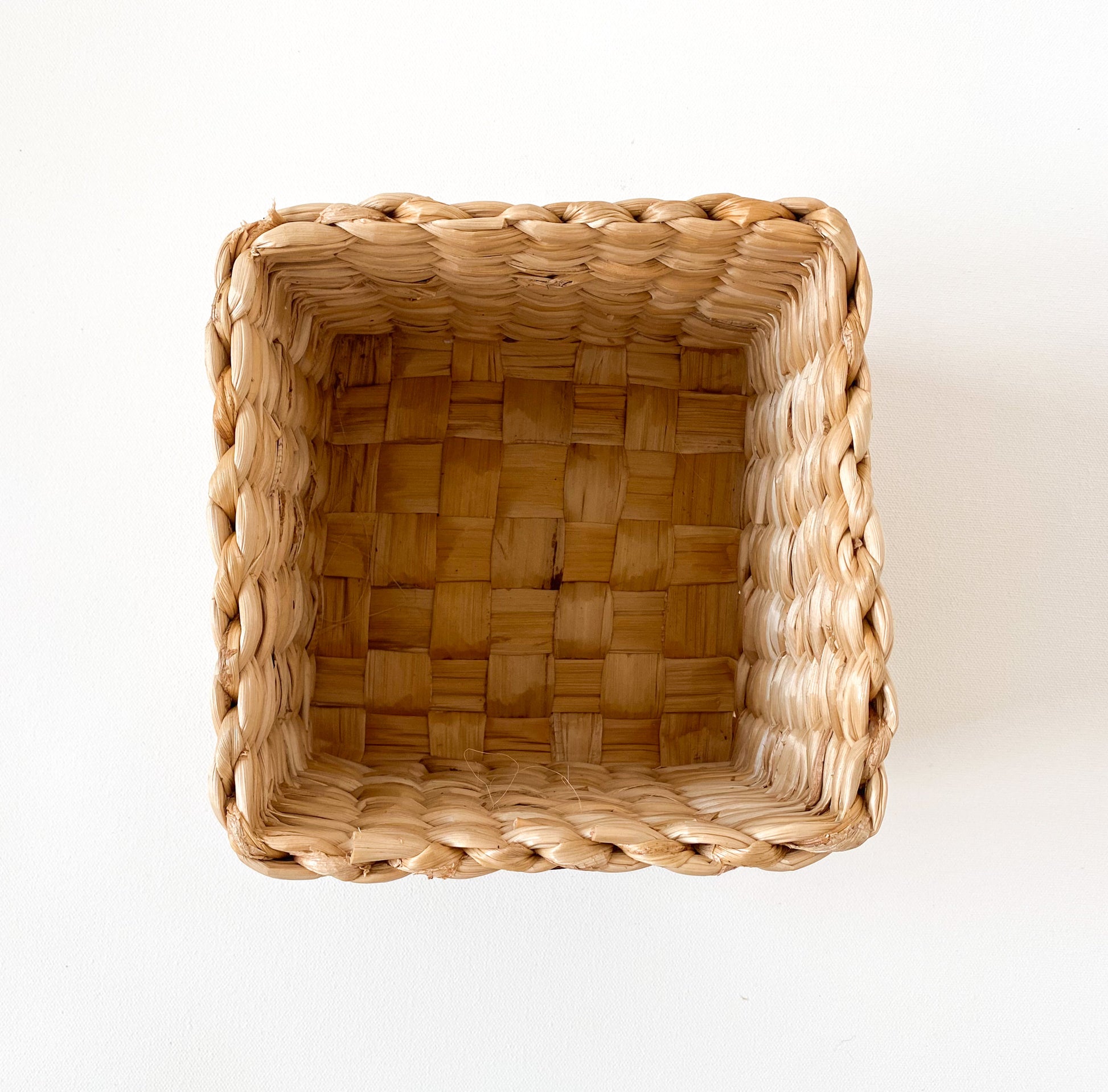 Evara’s artisanal storage basket handcrafted from 100% natural banana fiber, designed with a sturdy woven structure, minimalist aesthetic, and smooth natural finish. Ideal for organizing living spaces, storing linens, toys, or accessories. Lightweight yet durable, with reinforced edges and optional handles for easy mobility. A biodegradable, eco-friendly home décor piece that blends functionality with timeless elegance.