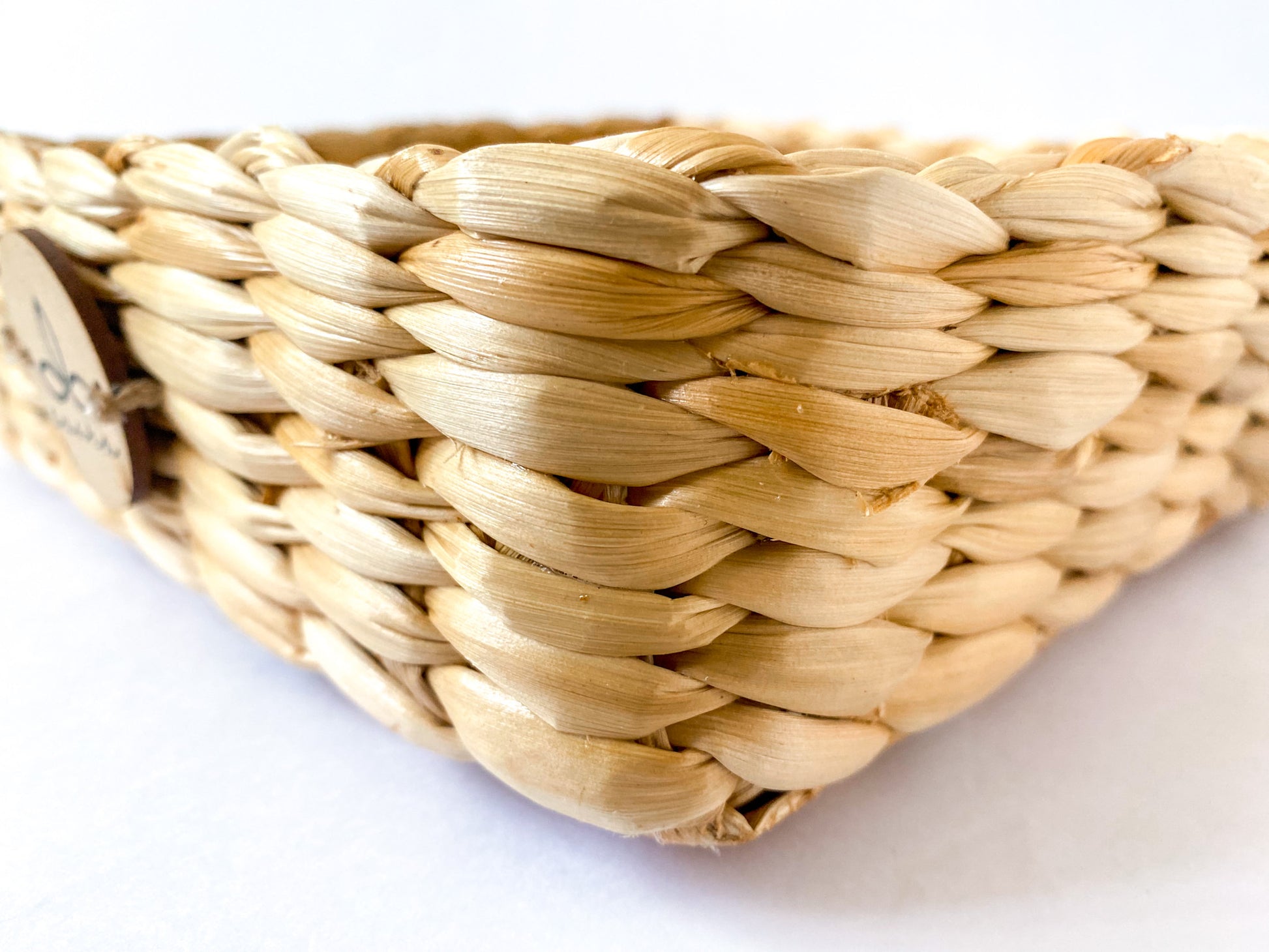 Evara’s artisanal storage basket handcrafted from 100% natural banana fiber, designed with a sturdy woven structure, minimalist aesthetic, and smooth natural finish. Ideal for organizing living spaces, storing linens, toys, or accessories. Lightweight yet durable, with reinforced edges and optional handles for easy mobility. A biodegradable, eco-friendly home décor piece that blends functionality with timeless elegance.