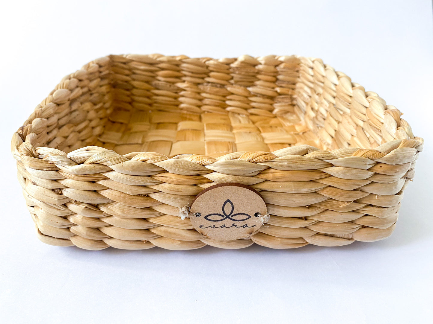 Evara’s artisanal storage basket handcrafted from 100% natural banana fiber, designed with a sturdy woven structure, minimalist aesthetic, and smooth natural finish. Ideal for organizing living spaces, storing linens, toys, or accessories. Lightweight yet durable, with reinforced edges and optional handles for easy mobility. A biodegradable, eco-friendly home décor piece that blends functionality with timeless elegance.