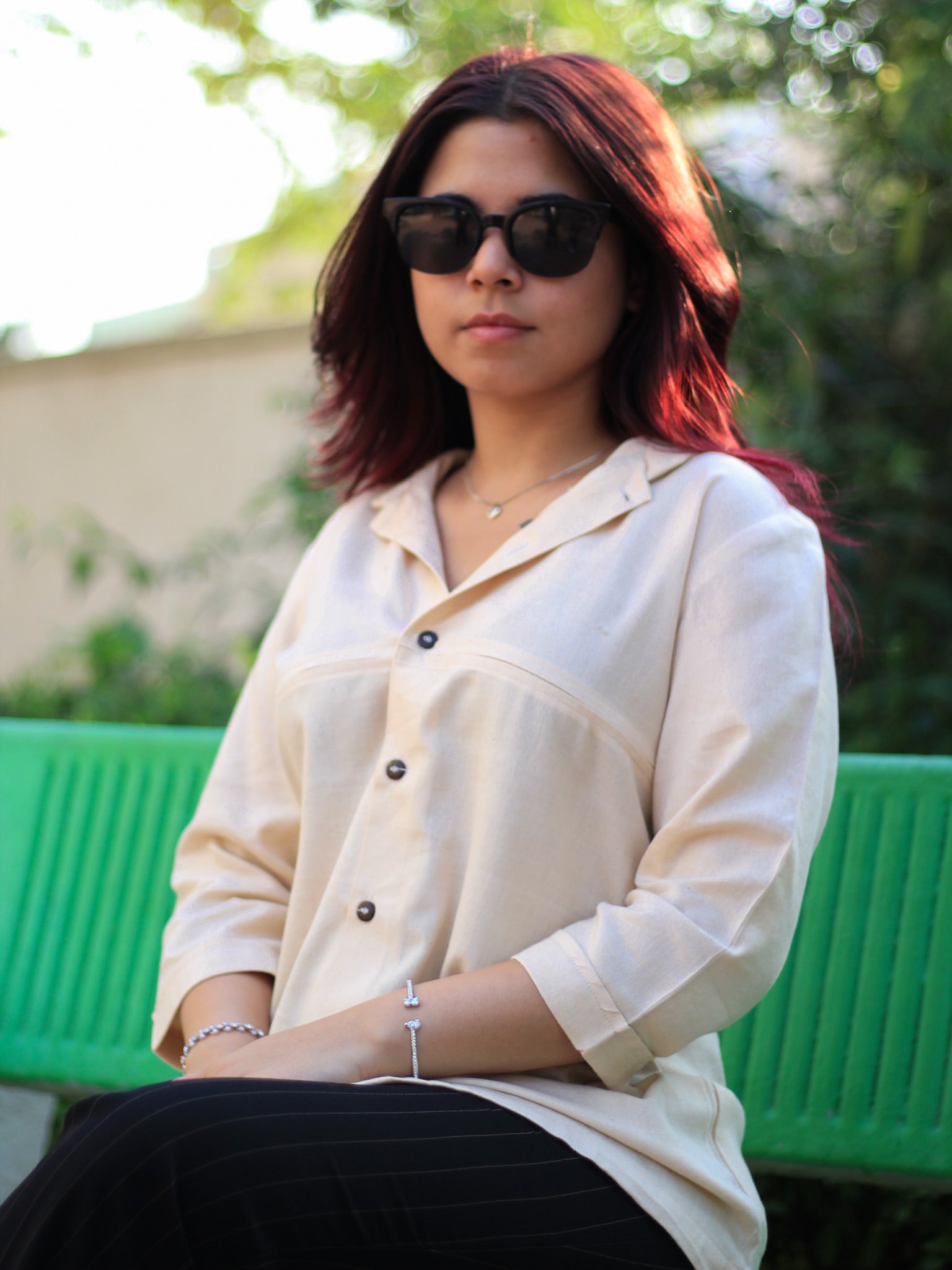 Model wearing Evara’s Buttercream Bliss Button-Down Shirt, crafted from a premium blend of banana fiber and cotton. This elegant three-quarter sleeve shirt in a golden hue features a mandarin collar, a structured yet relaxed fit, and a stylish button-down front. Designed for effortless versatility, it pairs perfectly with both formal and casual looks. Designed for consumers who appreciate natural fabrics and timeless fashion. Shop clothing at Evara.
