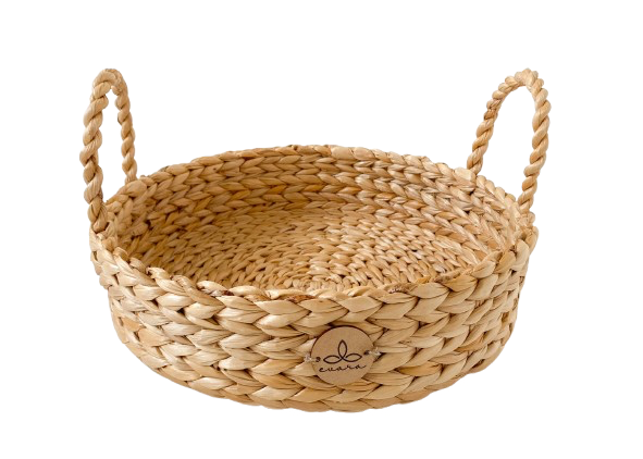 Evara’s artisanal storage basket handcrafted from 100% natural banana fiber, designed with a sturdy woven structure, minimalist aesthetic, and smooth natural finish. Ideal for organizing living spaces, storing linens, toys, or accessories. Lightweight yet durable, with reinforced edges and optional handles for easy mobility. A biodegradable, eco-friendly home décor piece that blends functionality with timeless elegance.