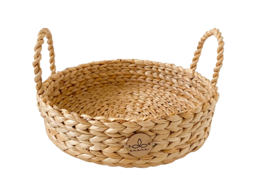 Evara’s artisanal storage basket handcrafted from 100% natural banana fiber, designed with a sturdy woven structure, minimalist aesthetic, and smooth natural finish. Ideal for organizing living spaces, storing linens, toys, or accessories. Lightweight yet durable, with reinforced edges and optional handles for easy mobility. A biodegradable, eco-friendly home décor piece that blends functionality with timeless elegance.