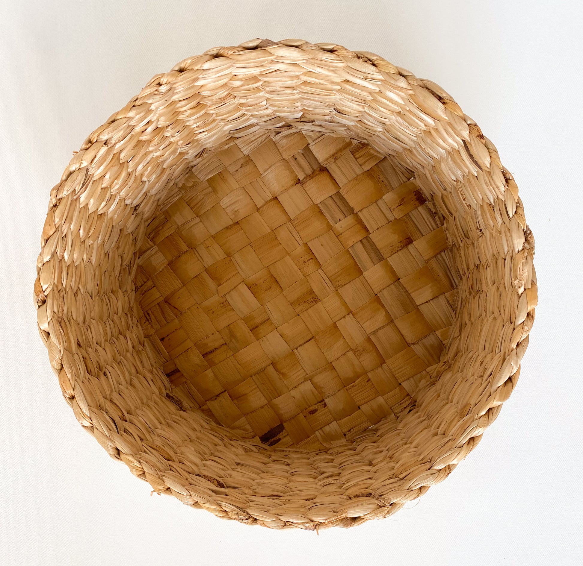 Evara’s artisanal storage basket handcrafted from 100% natural banana fiber, designed with a sturdy woven structure, minimalist aesthetic, and smooth natural finish. Ideal for organizing living spaces, storing linens, toys, or accessories. Lightweight yet durable, with reinforced edges and optional handles for easy mobility. A biodegradable, eco-friendly home décor piece that blends functionality with timeless elegance.